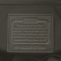 Coach Handbag with logo pattern