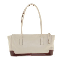 Prada Handbag in beige / red