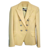 Balmain Jacke/Mantel aus Wolle in Gold