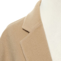 Acne Jacke/Mantel aus Wolle in Beige
