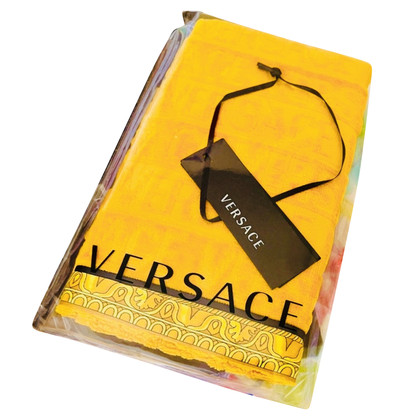 Versace Jacke/Mantel aus Baumwolle in Gold