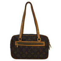 Louis Vuitton Cite Patent leather in Brown