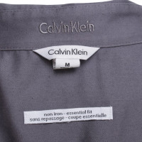 Calvin Klein blouse élégante et sportive