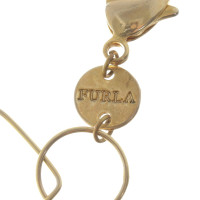 Furla De reeks van juwelen in gouden kleuren