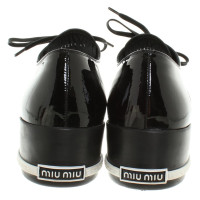 Miu Miu Sneakers aus Lackleder