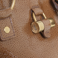 Yves Saint Laurent Patent leather handbag in Brown