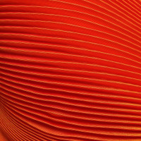 Hermès Plisseé cloth in orange