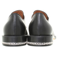 Givenchy Leather slippers in black