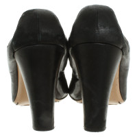 Chanel Pumps/Peeptoes aus Leder in Schwarz