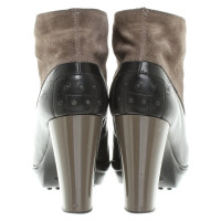 Tod's Ankle boots in black / taupe