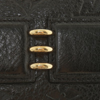 Louis Vuitton Sac en bandoulière avec monogramme en relief