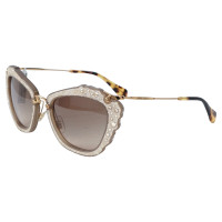 Miu Miu Sunglasses in Gold