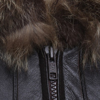 Yves Saint Laurent Veste en cuir avec garniture en fourrure