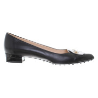 Tod's pumps in black / white