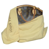 Louis Vuitton "Lockit PM Monogram Canvas"