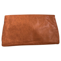Balenciaga clutch in orange-brown