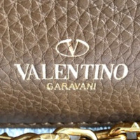 Valentino Garavani schoudertas